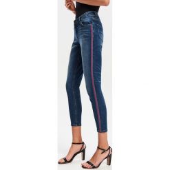 Jeansy slim z lampasem - Granatowy. Niebieskie jeansy damskie Reserved. Za 69,99 zł.