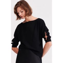 Sweter z wycięciami na rękawach - Czarny. Czarne swetry damskie Reserved, s, bez wzorów, bez rękawów, bez kaptura. Za 59,99 zł.