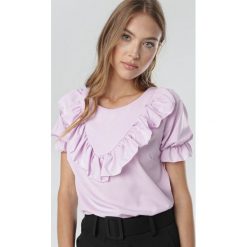 Fioletowa Bluzka Delalis. Fioletowe bluzki damskie Born2be, s, bez wzorów, bez kołnierzyka, bez rękawów. W wyprzedaży za 64,99 zł.