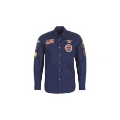 Koszule z długim rękawem U.S Polo Assn. PATCH SHIRT FC. Niebieskie koszule męskie U.S. Polo Assn., s, bez wzorów, polo, z długim rękawem. Za 439,00 zł.