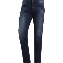 Cristiano Ronaldo CR7 Jeansy Slim Fit indigo. Niebieskie jeansy męskie relaxed fit marki Cristiano Ronaldo CR7. W wyprzedaży za 179,40 zł.