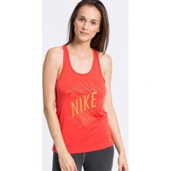 Nike - Top. Szare topy sportowe damskie Nike, s, z nadrukiem, z poliesteru, z okrągłym kołnierzem. W wyprzedaży za 49,90 zł.