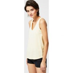 Top basic. Żółte bluzki damskie Moodo, xs, bez wzorów, bez kołnierzyka, bez rękawów. Za 9,99 zł.