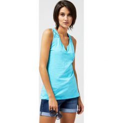 Top w kwiaty. Niebieskie bluzki damskie Moodo, xs, z nadrukiem, z bawełny, z dekoltem w serek. Za 14,99 zł.