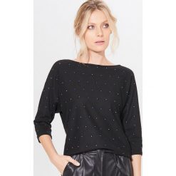 Sweter z aplikacją - Czarny. Czarne swetry damskie Mohito, s, z aplikacjami, bez rękawów, bez kaptura. W wyprzedaży za 59,99 zł.