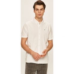 Clean Cut Copenhagen - Koszula. Białe koszule męskie Clean Cut Copenhagen, s, bez wzorów, z bawełny, casualowe, button down, z krótkim rękawem. W wyprzedaży za 119,90 zł.