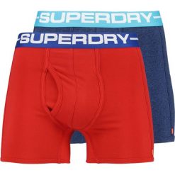 Superdry SPORT BOXER 2 PACK Panty sonic blast blu/yacht club red. Niebieskie bokserki męskie Superdry, z bawełny. Za 129,00 zł.