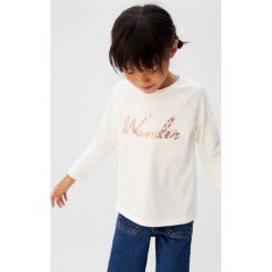 Mango Kids - Longsleeve dziecięcy Wonder 110-164 cm. Białe bluzki dziewczęce Mango Kids, z nadrukiem, z bawełny, z okrągłym kołnierzem, z krótkim rękawem, krótkie, bez kaptura. Za 59,90 zł.