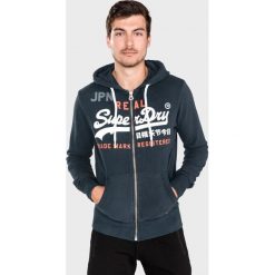 SuperDry Bluza Niebieski. Niebieskie bluzy męskie Superdry, m, z nadrukiem, z bawełny, bez kołnierzyka, bez rękawów, bez kaptura. Za 400,95 zł.