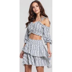 Kremowa Komplet Exact Nature. Brązowe spódniczki damskie Renee, s, bez wzorów, mini. Za 159,99 zł.