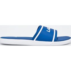 Lacoste - Klapki. Niebieskie kapcie męskie marki Lacoste, z materiału. W wyprzedaży za 149,90 zł.