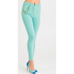 JEANSY Elisabetta Franchi. Jeansy damskie Elisabetta Franchi, bez wzorów, z jeansu, klasyczne, z podwyższonym stanem. Za 1269,00 zł.