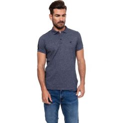 Koszuka polo w kolorze granatowym. Koszulki męskie Lonsdale, Kangol. W wyprzedaży za 69,95 zł.