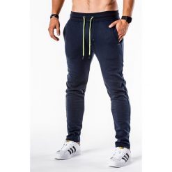 SPODNIE MĘSKIE DRESOWE P550 - GRANATOWE. Niebieskie spodnie dresowe męskie marki Ombre Clothing, s, z bawełny. Za 39,00 zł.