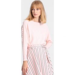Jasnoróżówy Sweter Around Us. Różowe swetry klasyczne damskie marki other, na zimę, xl, casualowe. Za 69,99 zł.