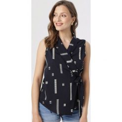 Granatowa Bluzka Idyia. Niebieskie bluzki damskie Born2be, xl, bez wzorów, bez kołnierzyka, bez rękawów. W wyprzedaży za 39,99 zł.