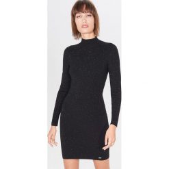 Sukienka bodycon z półgolfem - Czarny. Czarne sukienki damskie Mohito, s, bez wzorów, bez kołnierzyka, bez rękawów, bodycon. Za 119,99 zł.