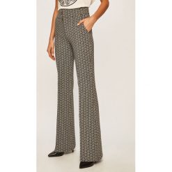 Tommy Hilfiger - Spodnie x Zendaya. Szare spodnie damskie TOMMY HILFIGER, z haftami, z elastanu, casualowe. Za 639,90 zł.