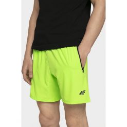 Spodenki treningowe męskie SKMF006 - zielony neon. Zielone spodenki i szorty męskie xxl, bez wzorów, z materiału. W wyprzedaży za 59,99 zł.