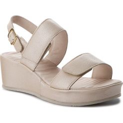 Sandały SCHOLL - Cora Sandal F26970 1030 360 Ivory. Szare klapki damskie marki Scholl, bez wzorów, ze skóry, bez obcasa, na obcasie. W wyprzedaży za 269,00 zł.