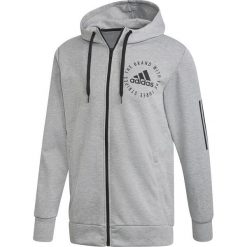 MĘSKA BLUZA ADIDAS PERFORMANCE FULL-ZIP. Szare bluzy męskie Adidas, m, bez wzorów, z poliesteru, sportowe, z kontrastowym kołnierzykiem, bez rękawów, bez kaptura. W wyprzedaży za 199,99 zł.