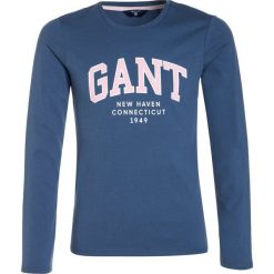 GANT Bluzka z długim rękawem evening blue. Niebieskie bluzki dziewczęce GANT, z bawełny, z długim rękawem. W wyprzedaży za 135,20 zł.