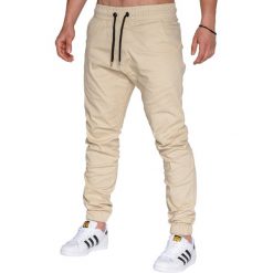 SPODNIE MĘSKIE JOGGERY P205 - BEŻOWE. Brązowe joggery męskie marki Ombre Clothing, s, z materiału. Za 79,00 zł.