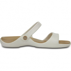 Klapki "Cleo" w kolorze biało-złotym. Białe klapki damskie marki Crocs, na wysokim obcasie. W wyprzedaży za 68,95 zł.