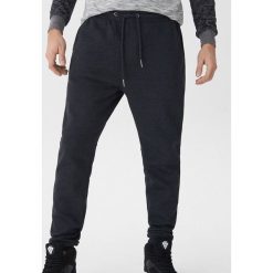 Dresowe joggery - Czarny. Czarne spodnie dresowe damskie marki House, s, z dresówki. Za 69,99 zł.