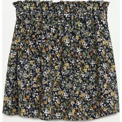 Mango Kids - Spódnica dziecięca Girasol. Czarne spódniczki dziewczęce Mango Kids, w kwiaty, z poliesteru, mini, rozkloszowane. Za 89,99 zł.