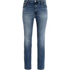 Jeansy Skinny Fit Tommy Jeans DM0DM06879. Niebieskie jeansy męskie Tommy Jeans, m, bez wzorów. W wyprzedaży za 269,00 zł.