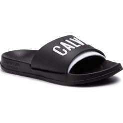 Klapki CALVIN KLEIN - Slide KW0KW00779 BEH. Czarne klapki damskie Calvin Klein, bez wzorów, z tworzywa sztucznego, bez obcasa. Za 129,00 zł.