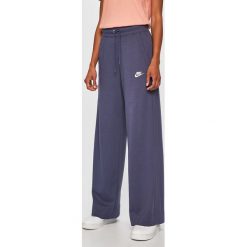 Nike Sportswear - Spodnie. Czarne spodnie damskie Nike Sportswear, s, bez wzorów, z bawełny, casualowe. W wyprzedaży za 199,90 zł.