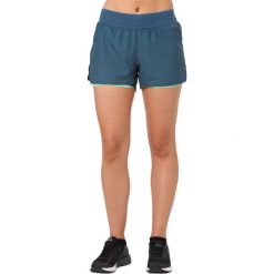 Spodenki Asics Cool 2in1 3.5 Inch W Ciemno-Niebieskie. Niebieskie spodenki sportowe damskie marki Asics, bez wzorów, z materiału, do biegania. Za 99,99 zł.