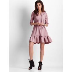 Sukienka trapezowa z falbaną różowa - 36. Różowe sukienki damskie e-margeritka.pl, bez wzorów, z tkaniny, eleganckie, bez rękawów, bez kaptura. Za 148,99 zł.