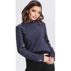 Granatowa Bluzka Reasonably. Niebieskie bluzki damskie marki other, xl, bez wzorów, z dzianiny, bez kołnierzyka, z długim rękawem. Za 39,99 zł.