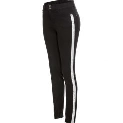 Dżinsy SKINNY z lampasami bonprix czarno-srebrny. Czarne jeansy damskie bonprix. Za 129,99 zł.
