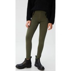 Mango Kids - Legginsy dziecięce Terry 110-164 cm. Niebieskie spodnie dziewczęce Mango Kids, bez wzorów, z elastanu. Za 45,90 zł.