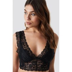Motel Rocks Sejie Cropped Top - Black. Czarne topy damskie marki Motel Rocks, bez wzorów, z materiału, bez kołnierzyka. Za 161,95 zł.