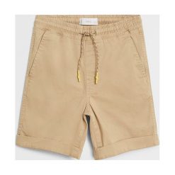 Mango Kids - Szorty dziecięce Roma 110-164 cm. Niebieskie spodenki chłopięce Mango Kids, bez wzorów, z elastanu, casualowe. Za 69,99 zł.