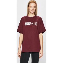 Nike - Top. Brązowe topy damskie Nike, s, z nadrukiem, z bawełny, z okrągłym kołnierzem. Za 199,90 zł.