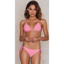 NA-KD Swimwear Metal Ring Tie Strap Panty - Pink. Różowe panty damskie NA-KD Swimwear, bez wzorów. W wyprzedaży za 24,38 zł.