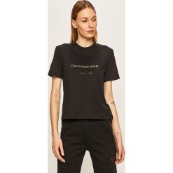Calvin Klein Jeans - T-shirt. Białe bluzki damskie Calvin Klein Jeans, xs, z nadrukiem, z bawełny, z okrągłym kołnierzem. W wyprzedaży za 139,90 zł.