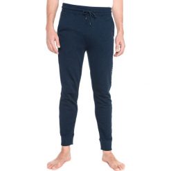 Tommy Hilfiger Spodnie do spania Niebieski. Niebieskie spodnie męskie TOMMY HILFIGER, s, z nadrukiem, z bawełny. Za 352,95 zł.