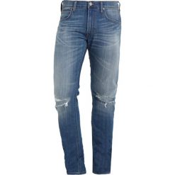 Lee LUKE Jeansy Slim Fit slam damage. Szare jeansy męskie relaxed fit marki Lee, z bawełny. W wyprzedaży za 296,10 zł.