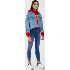 Jeansy skinny fit z lampasami. Niebieskie jeansy damskie skinny marki Pull&Bear, z jeansu. Za 139,00 zł.
