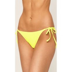 Guess Jeans - Figi kąpielowe. Żółte stroje kąpielowe damskie Guess Jeans, xs, z aplikacjami, z elastanu. W wyprzedaży za 99,90 zł.