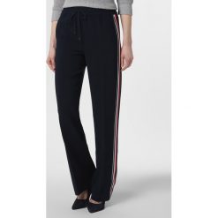 Tommy Hilfiger - Spodnie damskie, niebieski. Niebieskie spodnie damskie TOMMY HILFIGER, z dresówki, eleganckie. Za 599,95 zł.