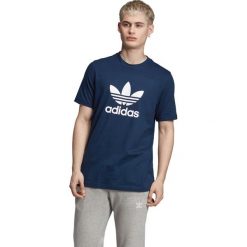 Adidas Originals Trefoil Koszulka Niebieski. Niebieskie podkoszulki męskie adidas Originals, s, z nadrukiem, z bawełny, bez kołnierzyka, z krótkim rękawem, krótkie. Za 111,95 zł.
