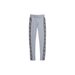 Legginsy damskie długie z lampasami. Szare legginsy TXM. Za 14,99 zł.